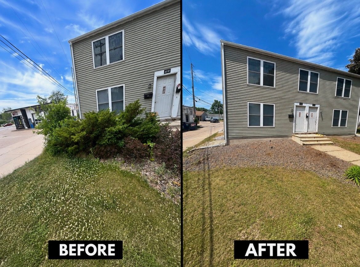 Before and after: heavy overgrowth removed and a clean rock bed installed at a commercial building
